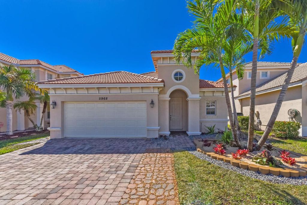 Photo of 5968 SE Crooked Oak Avenue, Hobe Sound, FL 33455 (MLS # R10962317)