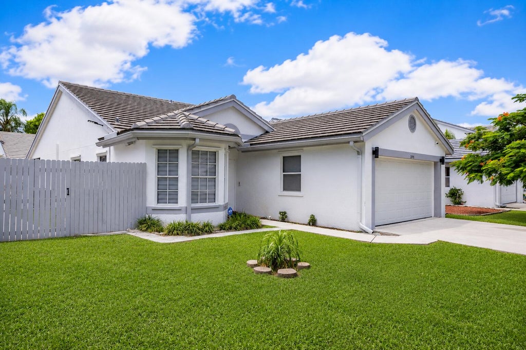 Photo of 2974 TORREY PINE Lane, Lake Worth, FL 33462 (MLS # B26069713)