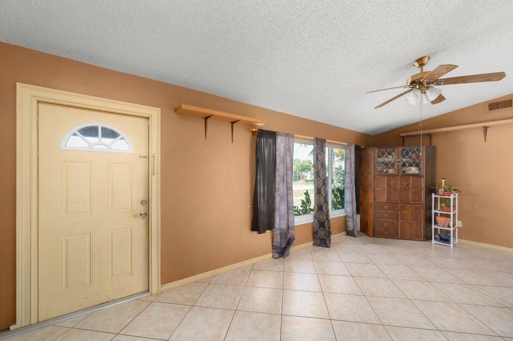 Photo of 1657 SE Sandia Drive, Port Saint Lucie, FL 34953 (MLS # R11156343)