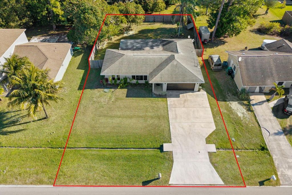 Photo of 1657 SE Sandia Drive, Port Saint Lucie, FL 34953 (MLS # R11156343)