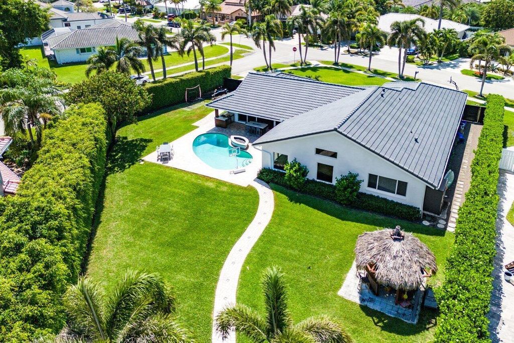 Photo of 7700 NE Spanish Trail Court, Boca Raton, FL 33487 (MLS # R11081481)