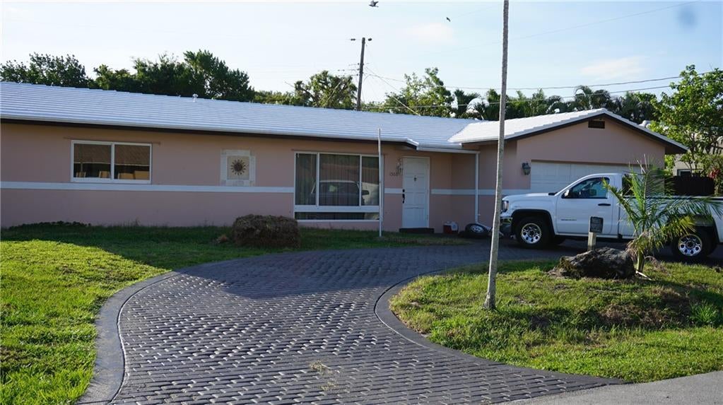 Photo of 1560 SE 24th Ave, Pompano Beach, FL 33062 (MLS # F10333327)
