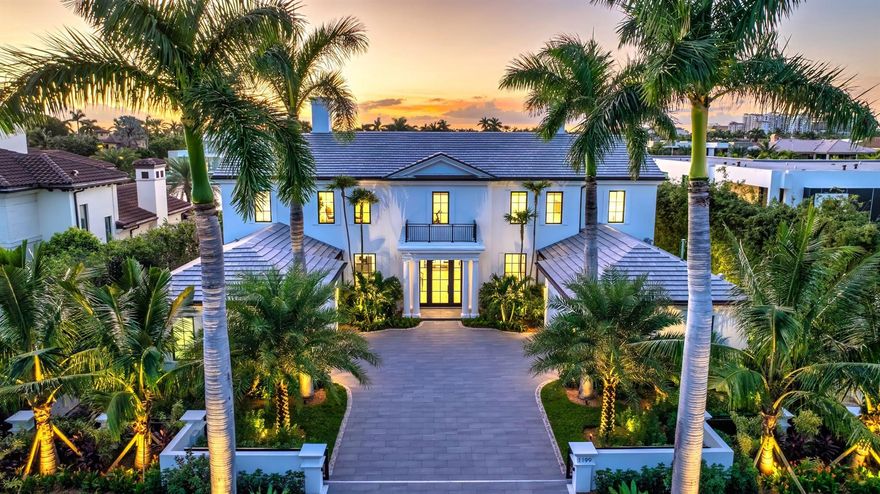 This sublime two-story was conceived in 2006 in the tropical Georgian style by Palm Beach architect Thomas Kirchhoff, and Mark Timothy Luxury Homes. In 2024 it has been remastered by Quinn Miklos Architects and Albanese Home Builders, Inc. with chic selections by Marc-Michaels Interior Design. The result is a tone-on-tone fusion with superb textures and finishes, and a modern flair that is pure perfection. The light-drenched residence offers breath-taking water views from all major rooms and a fresh understated visual appeal. Note the clubroom bar chevron-pattern book-matched Calacatta Manhattan marble back-splash, reverse-lit cove ceilings, wide plank beached oak floors, dual tone double island chef's kitchen, organic coral stone pool surround.Property This bespoke residence i