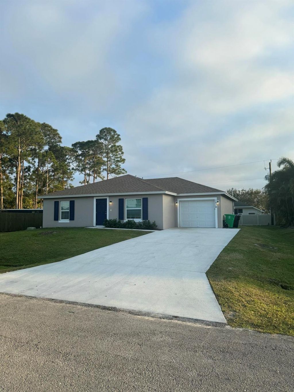 Photo of 1218 SW Asturia Avenue, Port St Lucie, FL 34953 (MLS # R11058253)
