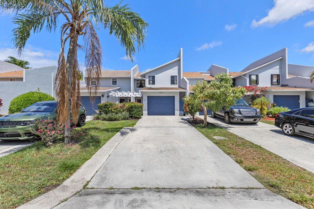 Photo of 1693 Woodbridge Lakes Circle, West Palm Beach, FL 33406 (MLS # R11086078)