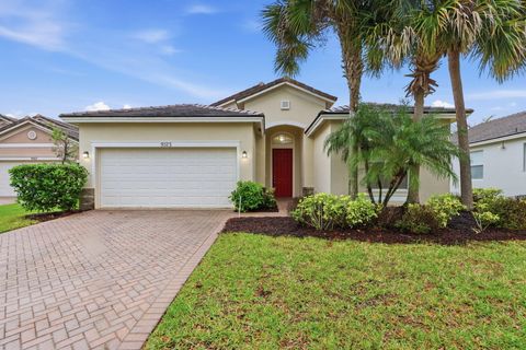 Photo of 9573 SW Flowermound Circle, Port Saint Lucie, FL 34987 (MLS # B26010741)