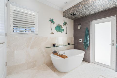 Tiny photo for 830 NE Boca Bay Colony Drive, Boca Raton, FL 33487 (MLS # B26009179)