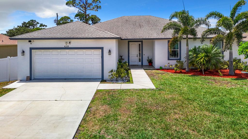 Photo of 4258 SW Mcclellen Street, Port Saint Lucie, FL 34953 (MLS # R10978916)