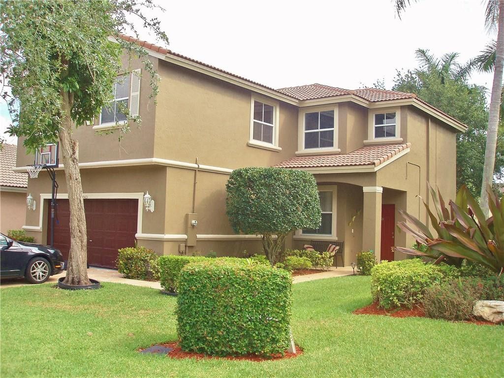 Photo of 5401 NW 49th Court, Coconut Creek, FL 33073 (MLS # B26003726)