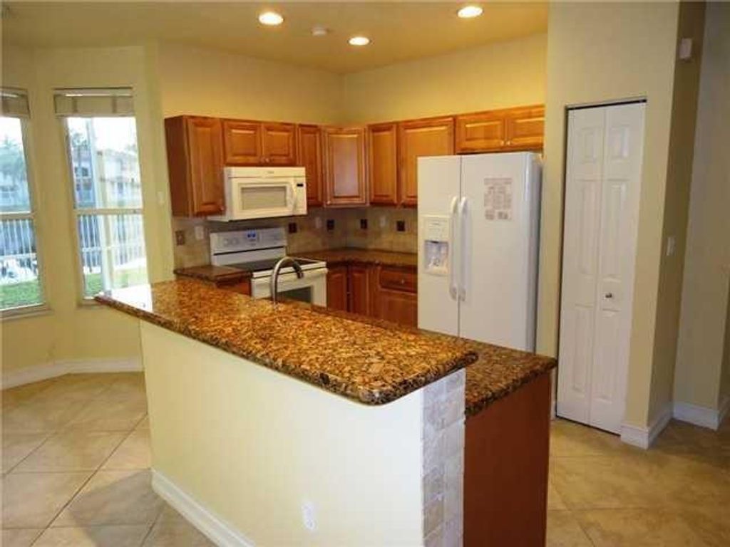 Photo of 5401 NW 49th Court, Coconut Creek, FL 33073 (MLS # B26003726)