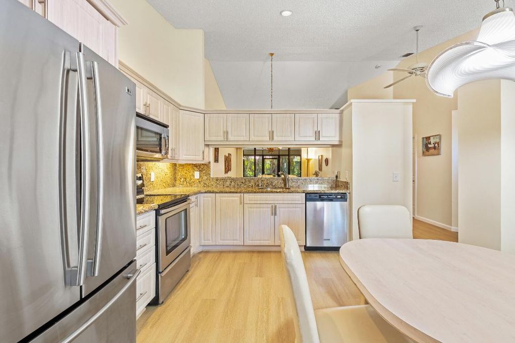 Photo of 7825 Lexington Club Boulevard #B, Delray Beach, FL 33446 (MLS # R10989381)