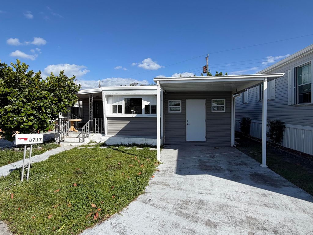 Photo of 8717 SW 16th Place, Davie, FL 33324 (MLS # B26019483)