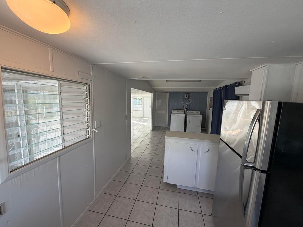Photo of 8717 SW 16th Place, Davie, FL 33324 (MLS # B26019483)