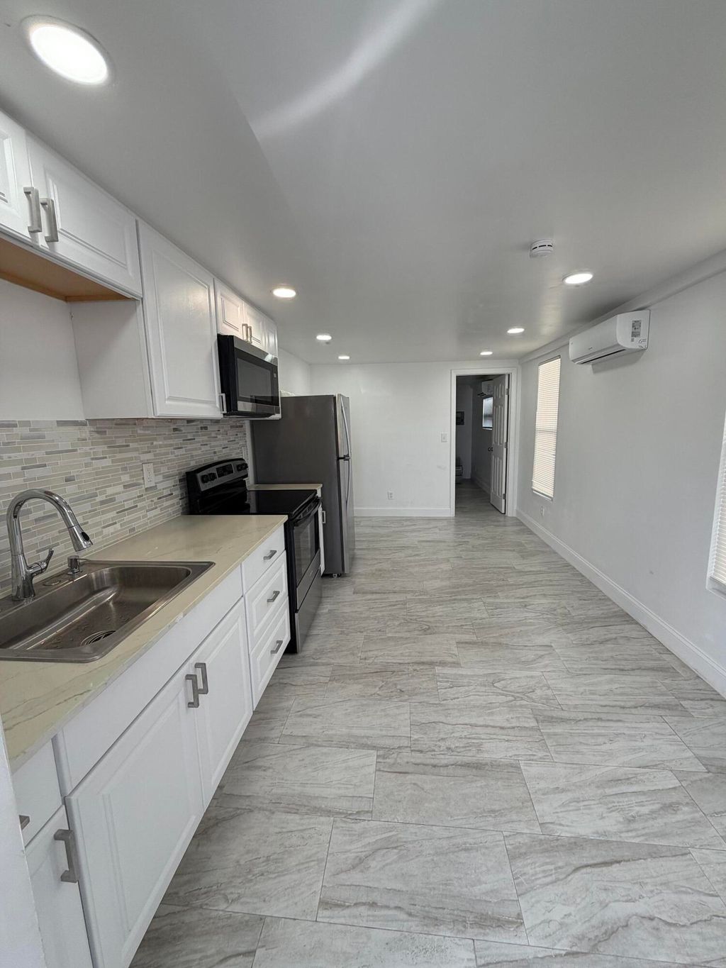 Photo of 8717 SW 16th Place, Davie, FL 33324 (MLS # B26019483)