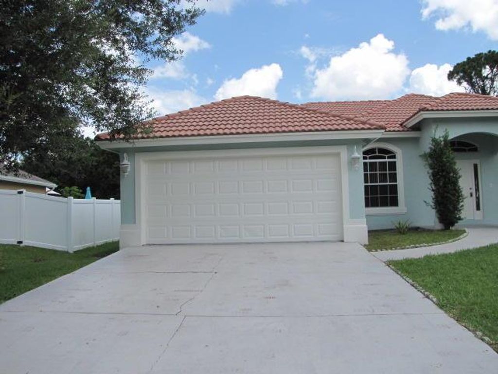 Photo of 1789 SW Desert Avenue, Port Saint Lucie, FL 34953 (MLS # R10946048)
