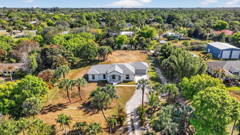 Photo of 15270 97th Drive N, Jupiter, FL 33478 (MLS # R11160997)