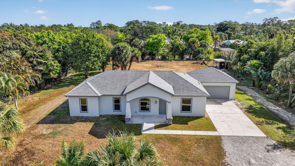 Photo of 15270 97th Drive N, Jupiter, FL 33478 (MLS # R11160997)