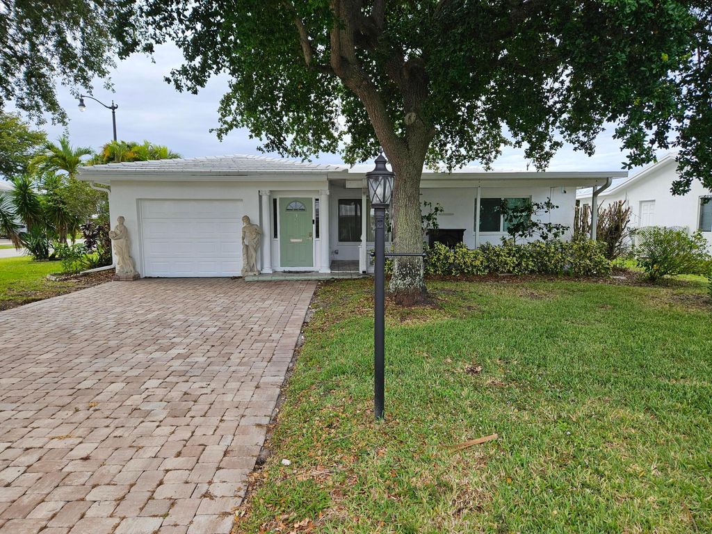 Photo of 391 Leisure Boulevard, Pompano Beach, FL 33064 (MLS # B26019898)