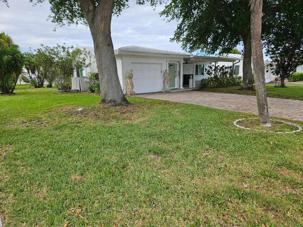 Photo of 391 Leisure Boulevard, Pompano Beach, FL 33064 (MLS # B26019898)