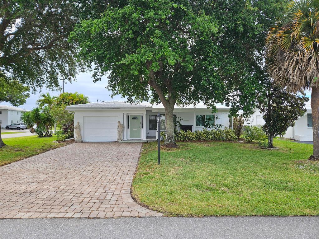 Photo of 391 Leisure Boulevard, Pompano Beach, FL 33064 (MLS # B26019898)