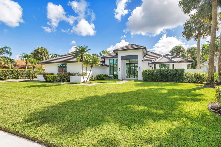 One of a kind Breakers West contemporary situated on a lush 1/2 acre property & private garden. The moment you enter this home you will be captivated by the natural light that pours in through 16ft floor to ceiling windows. This home speaks for itself in its striking beauty that simply causes you to sit down and take in every room, not wanting to leave. A rare opportunity to own this exquisite home presents itself to only the most discriminating of buyers. Two covered loggias overlook pool & garden. Features include: porcelain tile flooring throughout, hurricane impact glass, Brazilian walnut cabinetry, Thermador appliances & wet bar, 2020 roof, indoor/outdoor Sonos sound system, and high end architectural details throughout. Furniture available for purhcase