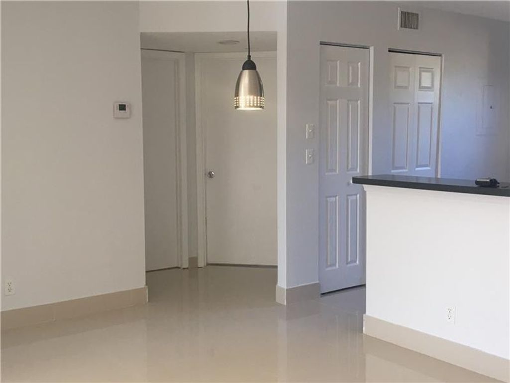 Photo of 10131 W Sunrise Boulevard #206, Plantation, FL 33322 (MLS # B26030036)
