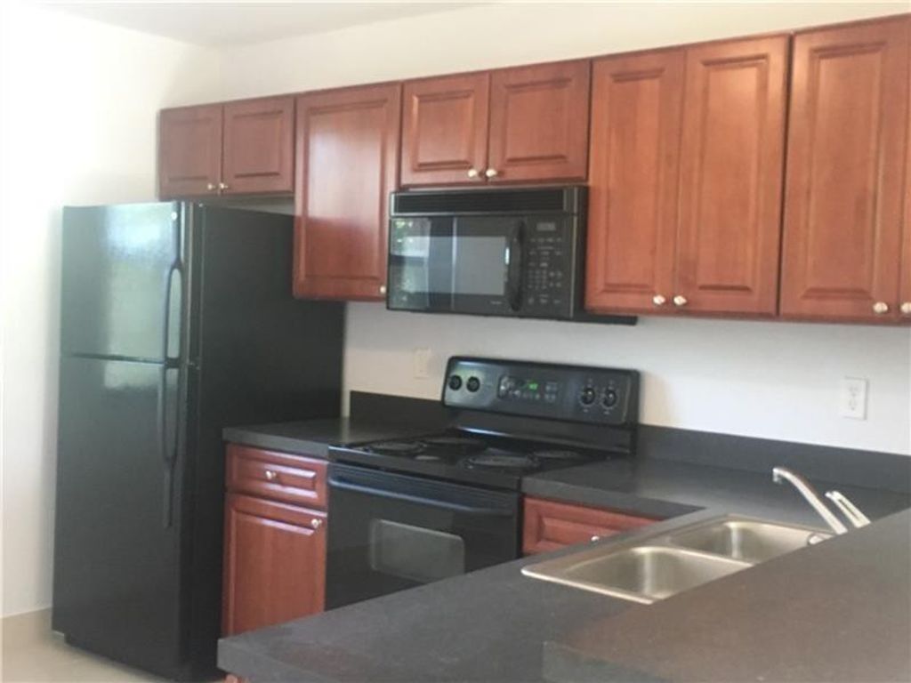 Photo of 10131 W Sunrise Boulevard #206, Plantation, FL 33322 (MLS # B26030036)