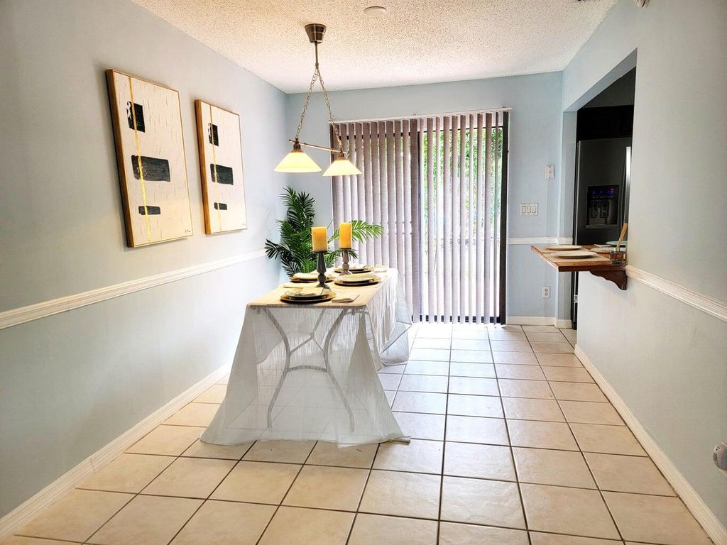 Photo of 4506 Pier Drive, Greenacres, FL 33463 (MLS # R10987369)