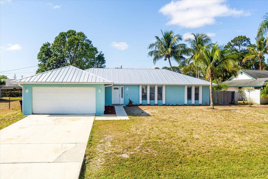 Photo of 782 SE Browning Avenue, Port Saint Lucie, FL 34983 (MLS # R11085981)