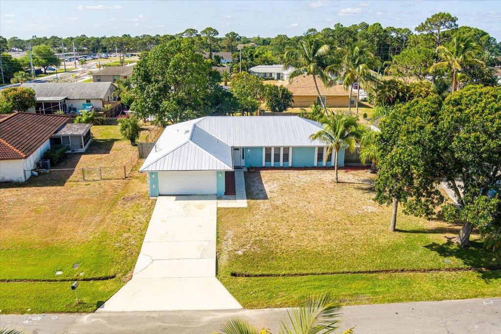 Photo of 782 SE Browning Avenue, Port Saint Lucie, FL 34983 (MLS # R11085981)