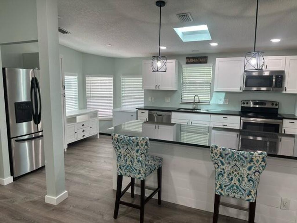Photo of 10103 Gaslight Court, Fort Pierce, FL 34945 (MLS # R11001014)