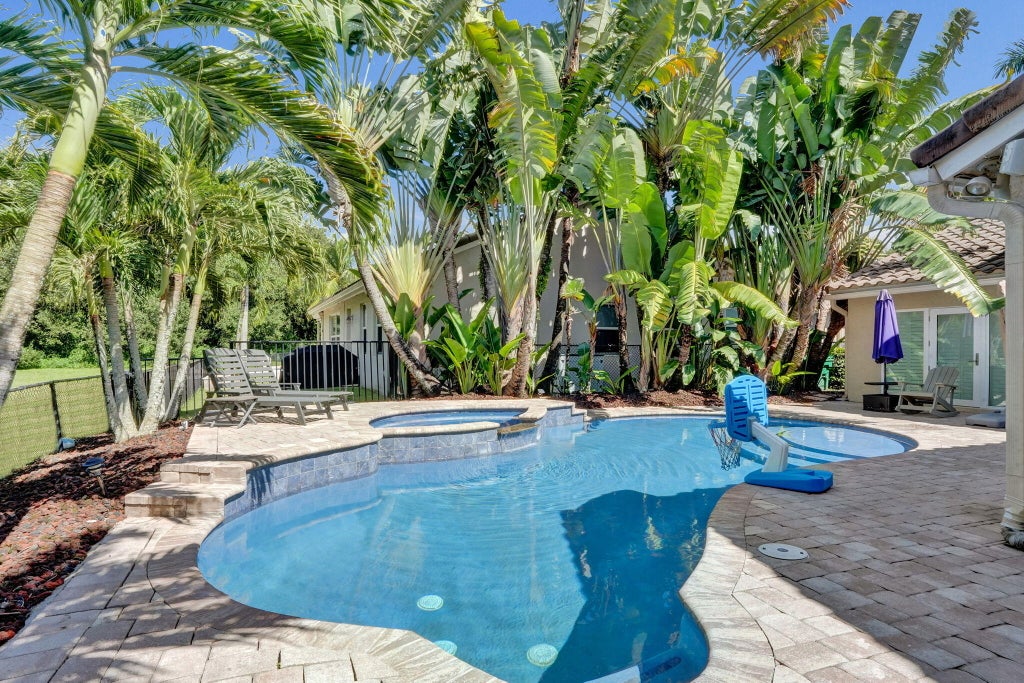 Photo of 9645 E Tree Tops Court, Davie, FL 33328 (MLS # B26081087)