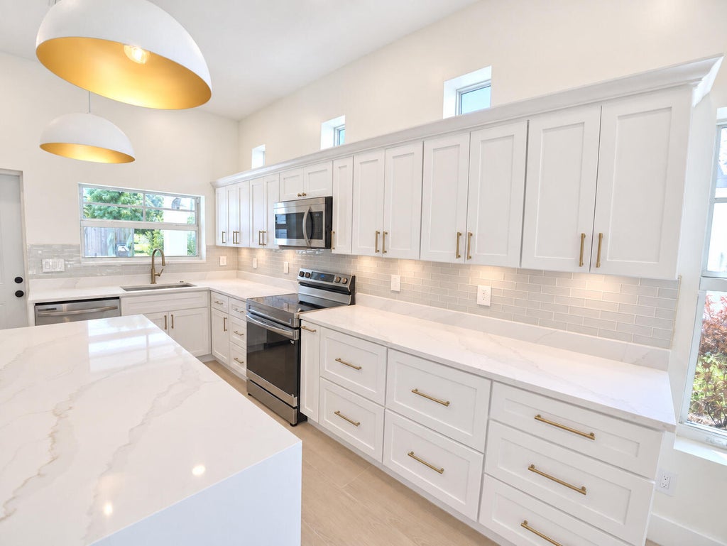 Photo of 520 38TH Street, West Palm Beach, FL 33407 (MLS # B26077329)