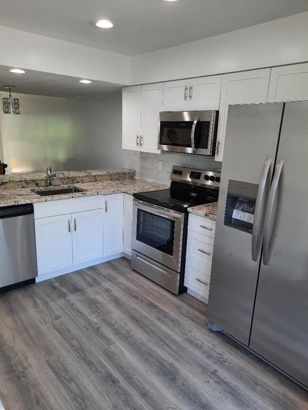 Photo of 6359 Riverwalk Lane #6, Jupiter, FL 33458 (MLS # R10739864)