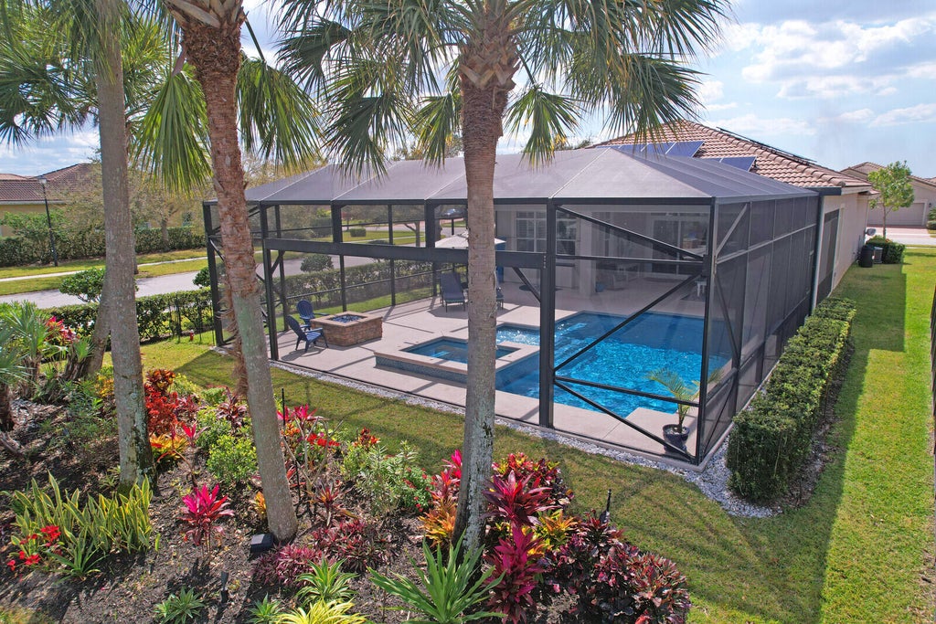 Photo of 10587 SW Capraia Way, Port Saint Lucie, FL 34986 (MLS # R10963616)