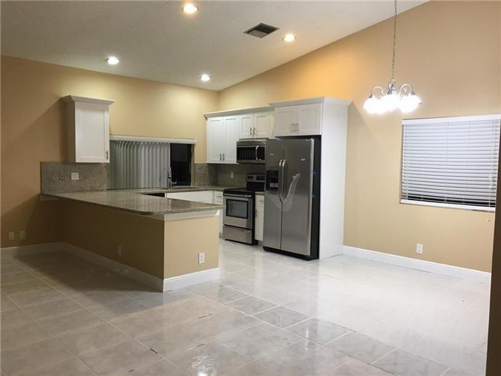 Photo of 9555 NW 25th Court, Coral Springs, FL 33065 (MLS # B26025127)