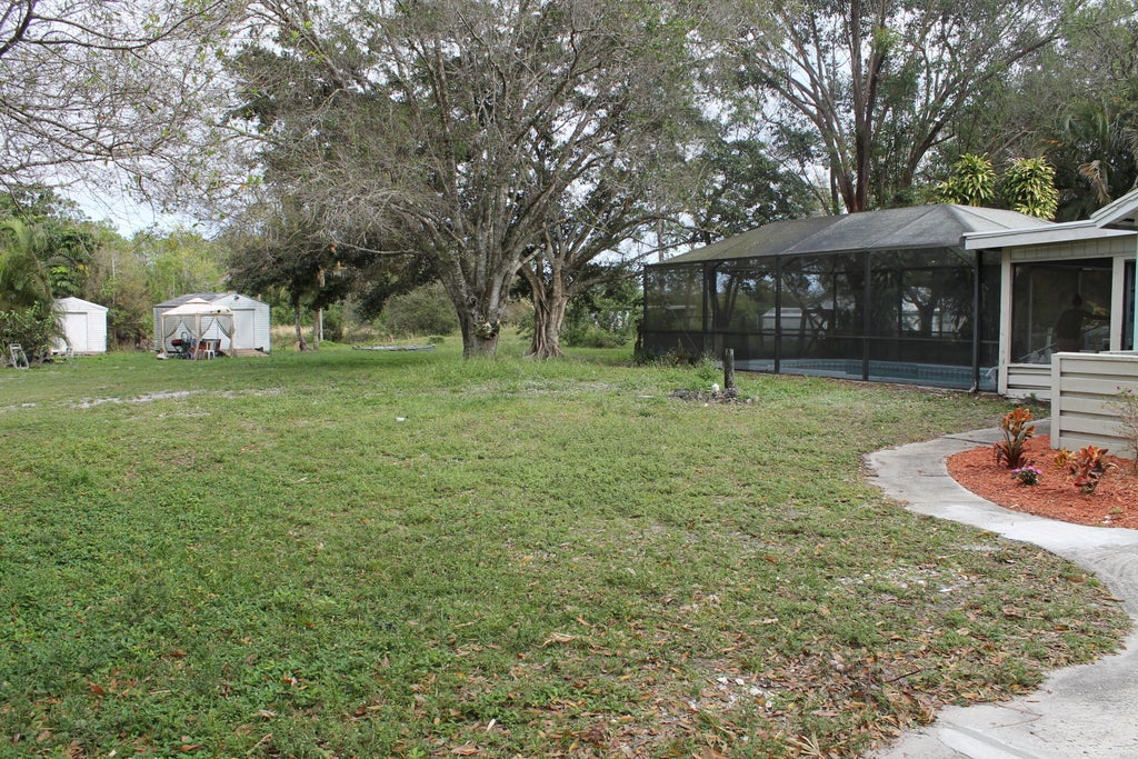 Photo of 7003 SW 39th Street, Palm City, FL 34990 (MLS # B26065393)