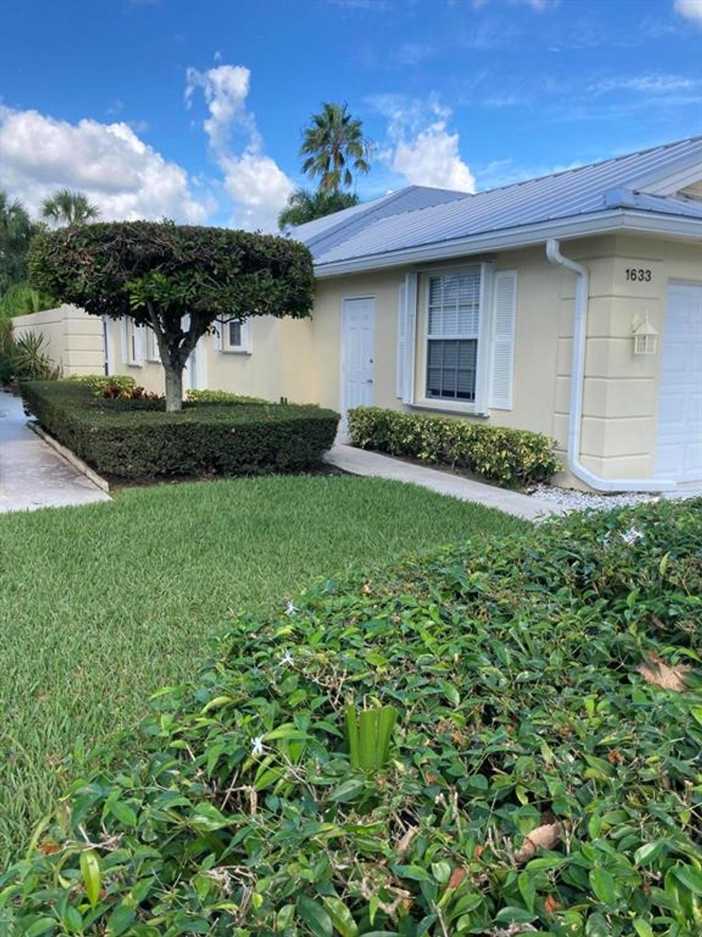 Photo of 1633 SW Waterfall Boulevard, Palm City, FL 34990 (MLS # R10748175)