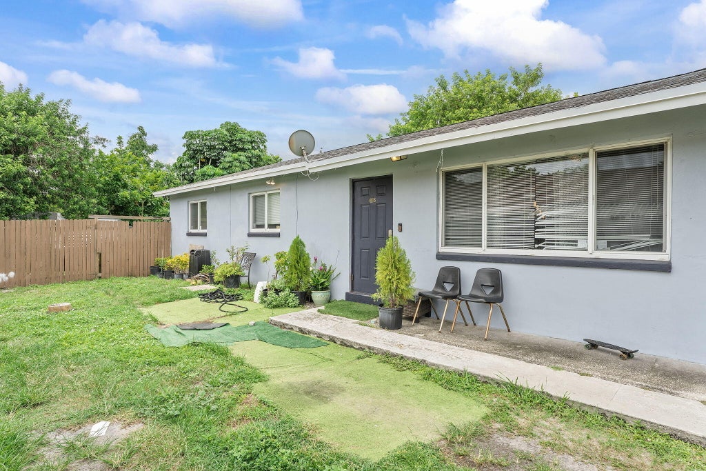 Photo of 4116 Plumosa Street, West Palm Beach, FL 33406 (MLS # B26053088)