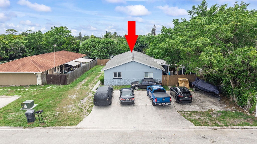 Photo of 4116 Plumosa Street, West Palm Beach, FL 33406 (MLS # B26053088)