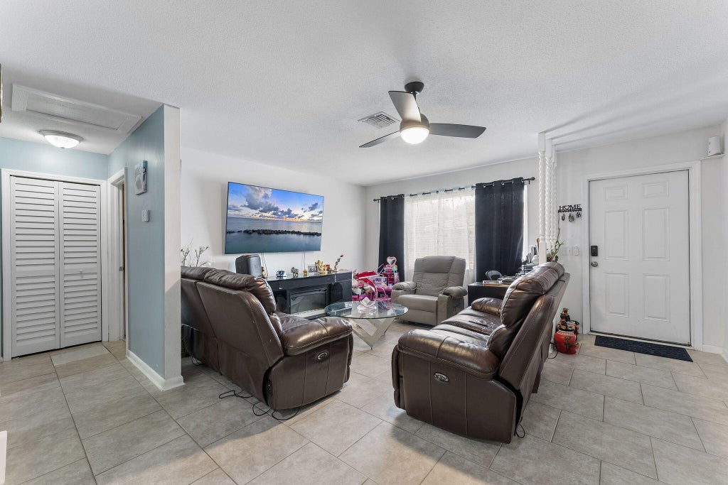 Photo of 4116 Plumosa Street, West Palm Beach, FL 33406 (MLS # B26053088)
