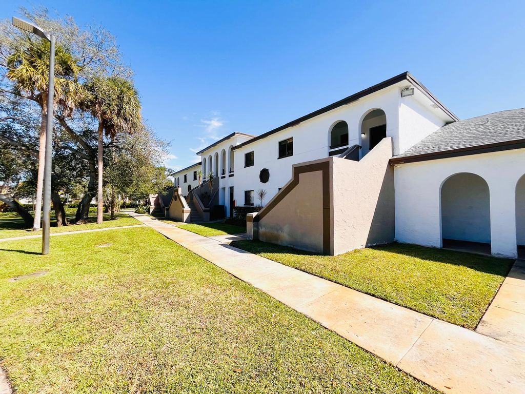 Photo of 100 W Hidden Valley Boulevard #110, Boca Raton, FL 33487 (MLS # R11160495)