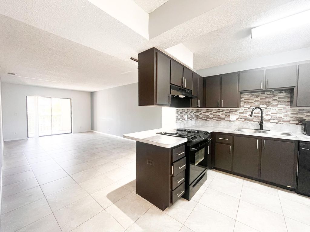 Photo of 100 W Hidden Valley Boulevard #110, Boca Raton, FL 33487 (MLS # R11160495)
