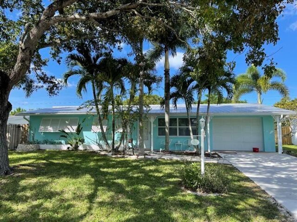 Photo of 407 Pittsburgh Drive, Jupiter, FL 33458 (MLS # R10753629)