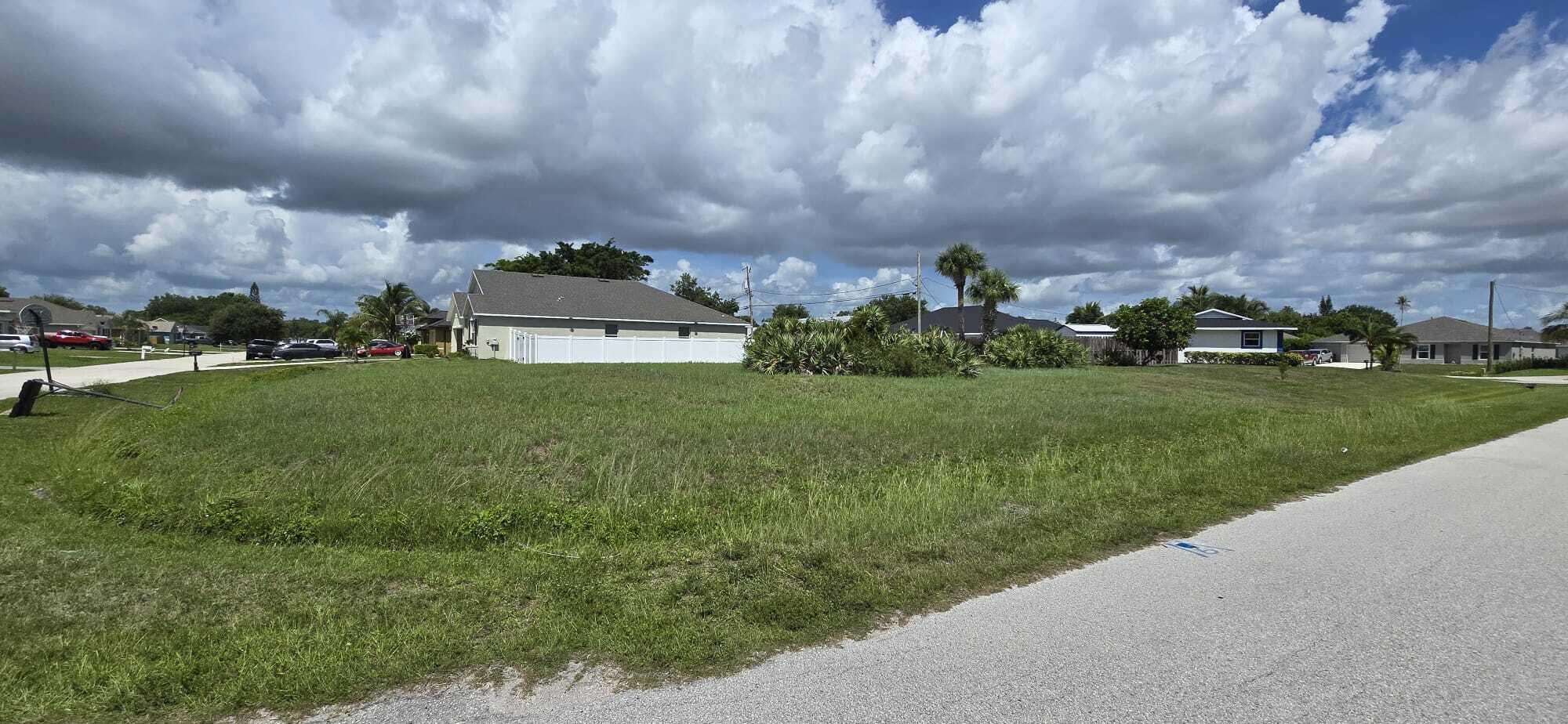 Build-ready lot by adjacent Tradition! NO HOA, NO CDD. Nestled in Port St. Lucie, one of Florida's fastest growing & desirable cities, noted for strong home equity gains & exceptional quality of life. This fully cleared *corner lot*+/-0.25 acre invites immediate construction*skip prep and save$25K+in site-clearing. Located in top-rated West Gate K-8, Bayshore Elementary, and St. Lucie West Centennial High zones, it's tailor-made for families or retirees looking for tranquility. Driving distance to Tradition's vibrant activities like Square-shops, dining, parks, events, and free autonomous shuttles. Just minutes from I95 & Turnpike for fast commuting. Adjacent to the upcoming Tradition Regional Park, featuring BMX, sports fields, playgrounds, trails, amphitheater, dog parks & great location