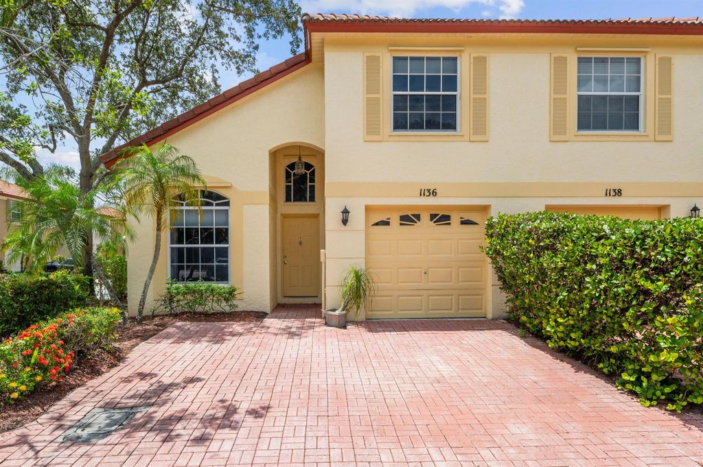 Photo of 1136 Via Jardin, Riviera Beach, FL 33418 (MLS # R10905636)
