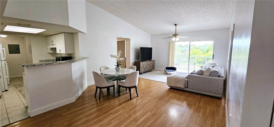Investor must see!! $2800.00 a month, lease expires 07/31/2024. 3-bedroom 2 bathroom with a washer & dryer in unit! No carpet! Gated community with fitness center, playground area, community pool, tennis courts. Located across the street from Monarch High School and the upscale Promenade shopping and dining. Sawgrass, Turnpike, and I-95 are minutes away, about 15-minute drive to the beach. Community getting major upgrades including new roofs and upgraded amenities. Great for investors, can rent right away. No vacation rentals allowed per community guidelines.