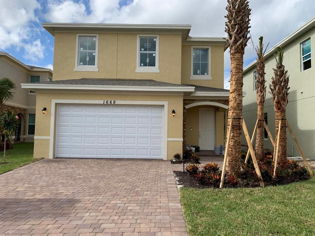 Photo of 1669 NW Cataluna Circle, Port Saint Lucie, FL 34986 (MLS # R10771529)