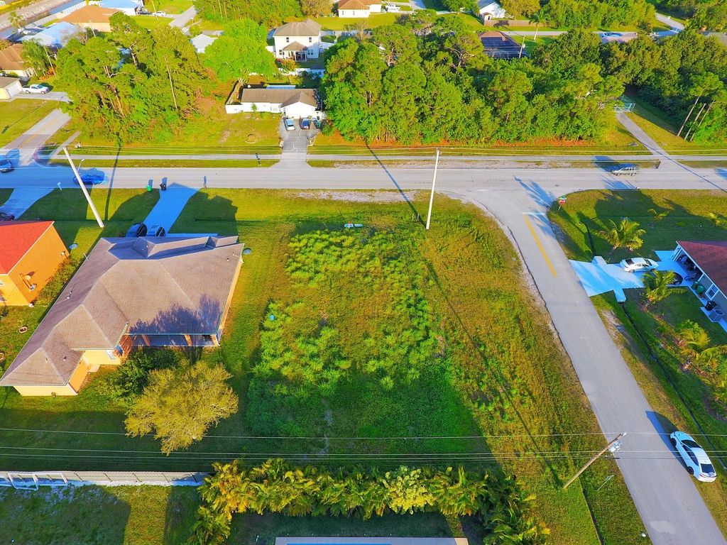 Photo of 1101 SW Haleyberry Avenue, Port Saint Lucie, FL 34953 (MLS # R10965553)