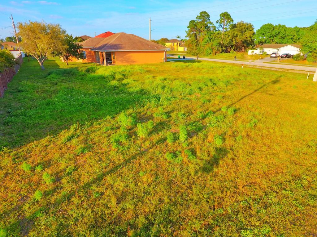 Photo of 1101 SW Haleyberry Avenue, Port Saint Lucie, FL 34953 (MLS # R10965553)